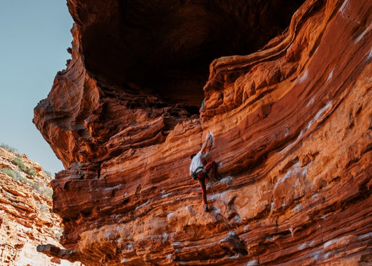Rock Climber Using White Climbing Chalk in Kalbarri Western Australia