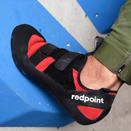 Close up of Redpoint Climbing shoes on a boulder