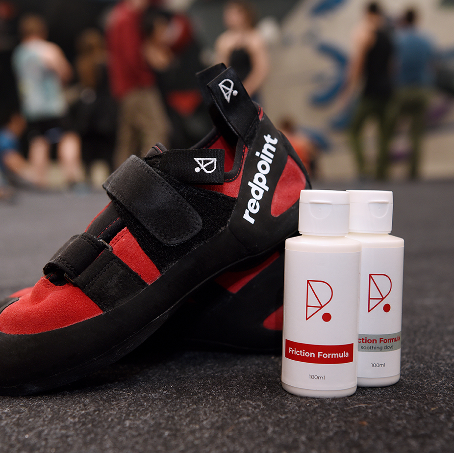 Redpoint climbing shoes and liquid chalk